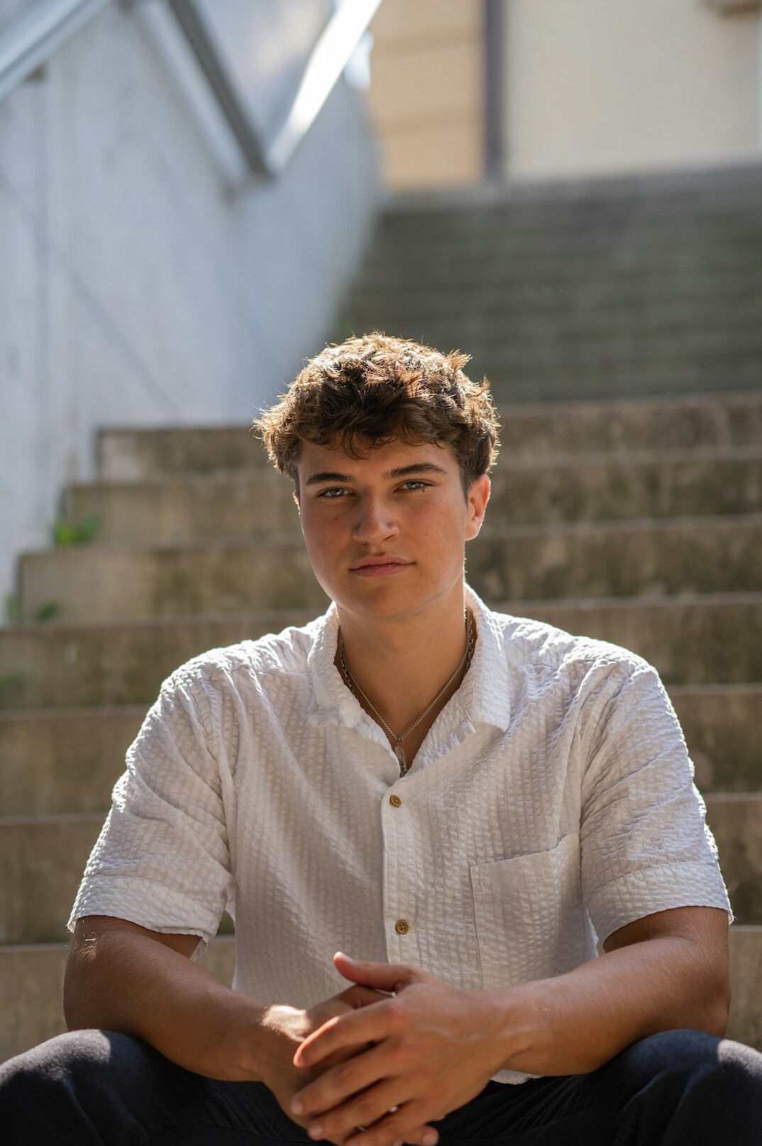 Portrait of a young man in a light shirt
